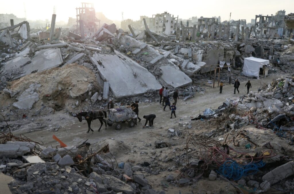 Members of the Nijim family hang laundry on the ruins of their house, amid widespread destruction caused by the Israeli military's ground and air offensive in Jabaliya, Gaza Strip, on Feb. 18, 2025.
