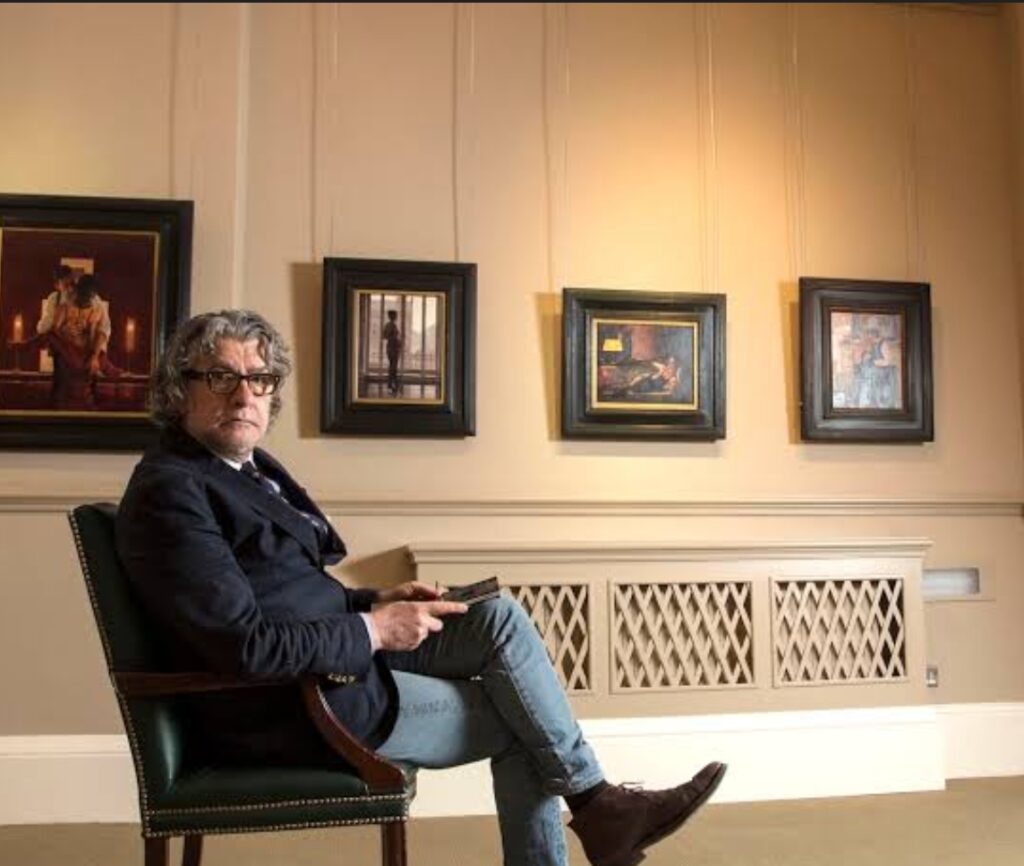 In an undated stock photo,Jack Vettriano with one of his paintings at Kelvingrove art gallery